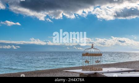 Rusty bird cage by the Adriatic Sea Stock Photo