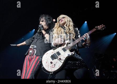 Alice Cooper and Orianthi Panagaris perform at the Civic Hall in Wolverhampton. Stock Photo