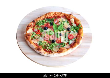 Overhead  shot of Bufala pizza on wooden plank. Isolated on white with clipping path Stock Photo
