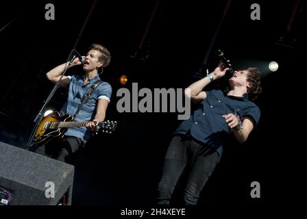Bradley Will-Simpson and James McVey of The Vamps on stage on day 1 of the Fusion Festival on August 31, 2013 in Cofton Park Birmingham, England. Stock Photo