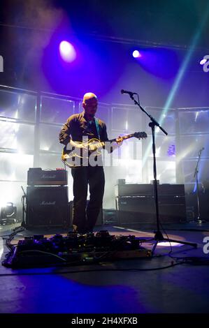 Joey Santiago of The Pixies performs on stage at Manchester Apollo in Manchester.  Stock Photo