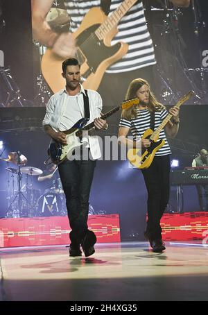 James Valentine and Adam Levine of Maroon 5 performing live on the first night of the UK tour at the LG Arena - Birmingham Stock Photo