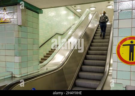 BERLIN, GERMANY - Oct 04, 2021: A passenger going up the stairs in the S Bahn station, Berlin Stock Photo