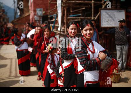 Lalitpur, Bagmati, Nepal. 5th Nov, 2021. Girls in a traditional attire during a parade of Nhu Dan (the Newari New Year), which falls on Tihar or Deepawali and Dewali Festival of Lights at Khokana, Lalitpur, Nepal on Friday, Nov 5, 2021. Credit: Amit Machamasi/ZUMA Wire/Alamy Live News Stock Photo