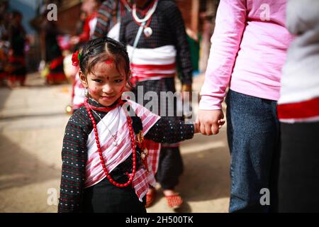 Lalitpur, Bagmati, Nepal. 5th Nov, 2021. Girls in a traditional attire during a parade of Nhu Dan (the Newari New Year), which falls on Tihar or Deepawali and Dewali Festival of Lights at Khokana, Lalitpur, Nepal on Friday, Nov 5, 2021. Credit: Amit Machamasi/ZUMA Wire/Alamy Live News Stock Photo