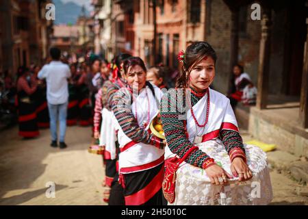 Lalitpur, Bagmati, Nepal. 5th Nov, 2021. Girls in a traditional attire during a parade of Nhu Dan (the Newari New Year), which falls on Tihar or Deepawali and Dewali Festival of Lights at Khokana, Lalitpur, Nepal on Friday, Nov 5, 2021. Credit: Amit Machamasi/ZUMA Wire/Alamy Live News Stock Photo