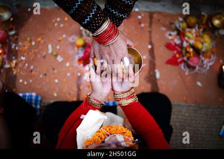 Lalitpur, Bagmati, Nepal. 5th Nov, 2021. People take part in a mass Mha: Puja meaning worshipping oneself or body at Khokana of Lalitpur District of Nepal. Mha: Pooja is conducted on fourth day of five days Tihar festival in Nepal especially by Newa: community. Credit: Amit Machamasi/ZUMA Wire/Alamy Live News Stock Photo