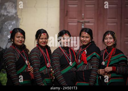 Lalitpur, Bagmati, Nepal. 5th Nov, 2021. Girls in a traditional attire poses for a photo during a parade of Nhu Dan (the Newari New Year), which falls on Tihar or Deepawali and Dewali Festival of Lights at Khokana, Lalitpur, Nepal on Friday, Nov 5, 2021. Credit: Amit Machamasi/ZUMA Wire/Alamy Live News Stock Photo