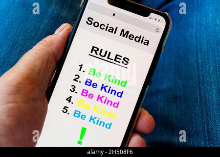 Social media rules viewed on a mobile phone (digitally altered) Stock Photo
