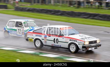 1980 Toyota Corolla1600GT Coupé with driver Matt Green during the Gerry Marshall Trophy heats at the Goodwood 78th Members Meeting, Sussex, UK. Stock Photo