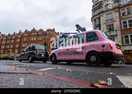 LONDON, UNITED KINGDOM - Oct 10, 2019: A typical London taxi cab in the London city center Stock Photo