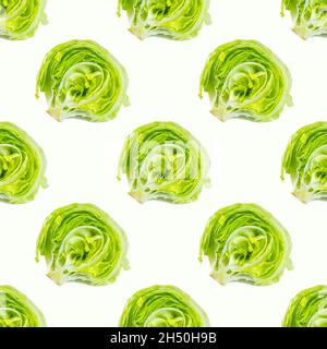 Fresh green iceberg lettuce salad leaves seamless repeat pattern on white background. Stock Photo