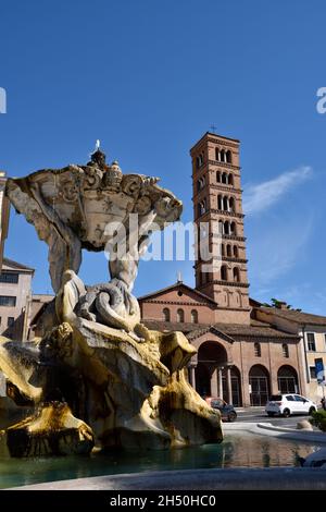 Italy, Rome, fountain of the Tritons and basilica di Santa Maria in Cosmedin Stock Photo