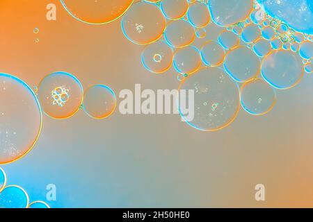 Abstract light background with bubbles. Gradient blue-orange backdrop Stock Photo