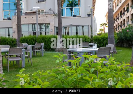 Cafe, outdoor restaurant on the embankment by the sea. Kemer Turkey 08. 25. 2021 Stock Photo