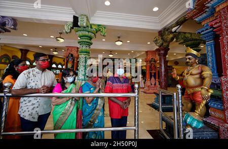 Kuala Lumpur, Malaysia. 04th Nov, 2021. Hindu devotees seen offering prayers at the Batu Caves temple during the festival.Diwali is one of the major religious festivals in Hinduism. The Goddess Lakshmi, the god of wealth is worshiped during Diwali for happiness, prosperity, and fame. Credit: SOPA Images Limited/Alamy Live News Stock Photo