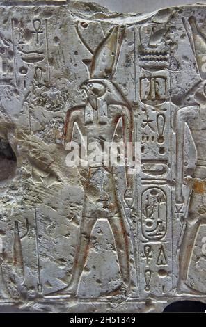 Ancient Egyptian relief mural detail of Ramesses II making offerings to Horus, 1279-1213, Adydos. Louvre Museum B20 N132. In 2 scenes, from left - Ram Stock Photo