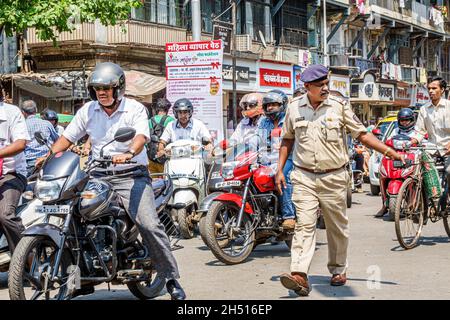 Mumbai India,Tardeo,Jehangir Boman Behram Road,traffic officer policeman polic motorcycles motor scooters busy Stock Photo