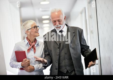 senior busniess people talking office communication Stock Photo
