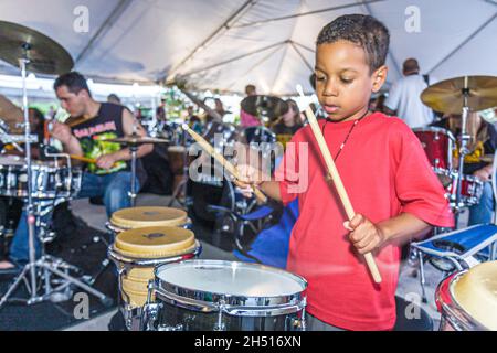 Miami Florida,Hollywood,Arts Park,The Big Beat,Guinness Book world record most drummers,drum set playing sticks Hispanic boy male kid child student Stock Photo