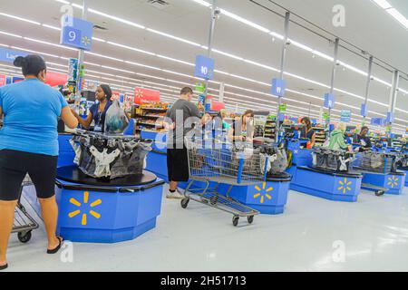 Naples Florida,Walmart Big-Box discount,shopping shoppers market marketplace store checkout line queue cashier cashiers customer employees workers Stock Photo