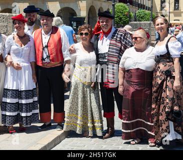 Local people dressed in period costume celebrating during Ronda's May Fair also known as Ronda Romantica, or Romantic Ronda.  It is one of the oldest Stock Photo