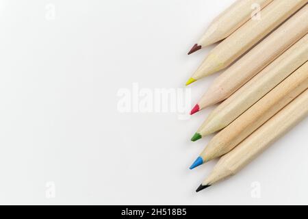 Set of colored pencils on a white background arranged in a row Stock Photo