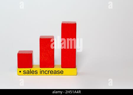 sales inreased is written on children's building blocks and represents the increase in space with the blocks Stock Photo
