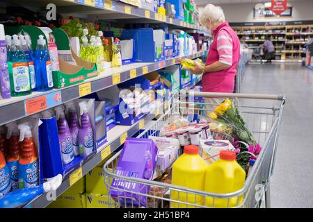 Shopping trolley of essential items in ALDI supermarket, discount store London England Stock Photo