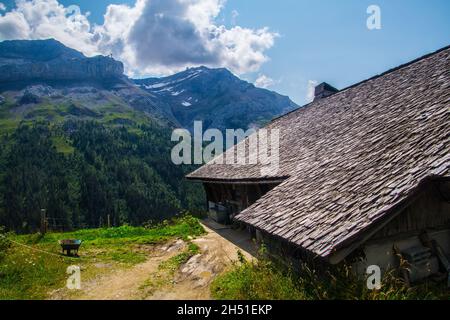 Beautiful view of Les Diablerets in the lake of retaud in Valais in Switzerland Stock Photo
