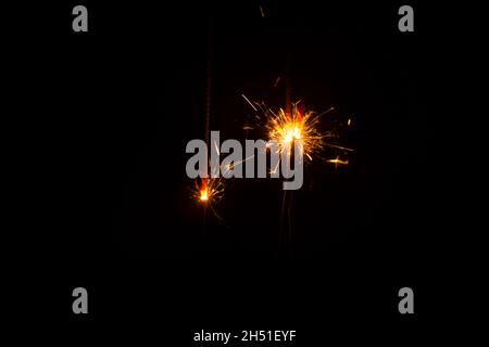Happy New Year, a shimmering, burning sparkle on a black background Stock Photo