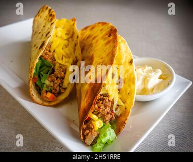 Western international  food as served in SE Asia. Stock Photo