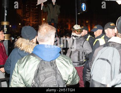 London, UK. 05th Nov, 2021. A protester is arrested In Westminster Credit: graham mitchell/Alamy Live News Stock Photo