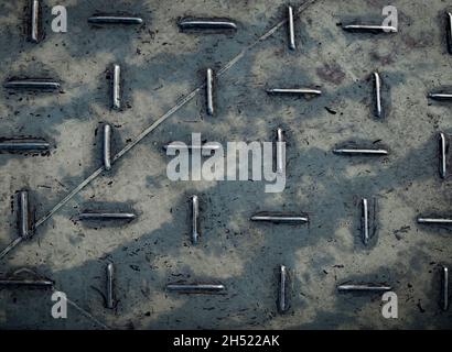 Texture of metal Diamond plate steel floor of ferry with diamond pattern. Old metal floor background. Stock Photo