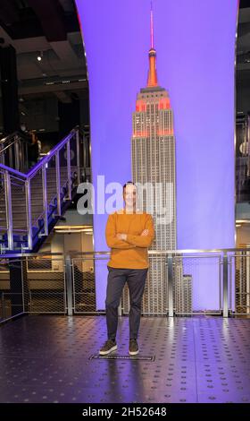 New York, NY - November 5, 2021: Actor Tony Hale attends Empire State Building hosting cast of Clifford the Big Red Dog movie, ESB will be lit in red to celebrate the release of the film Stock Photo