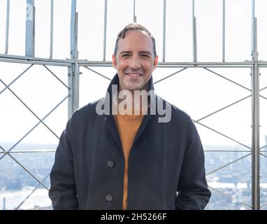 New York, NY - November 5, 2021: Actor Tony Hale attends Empire State Building hosting cast of Clifford the Big Red Dog movie, ESB will be lit in red to celebrate the release of the film Stock Photo