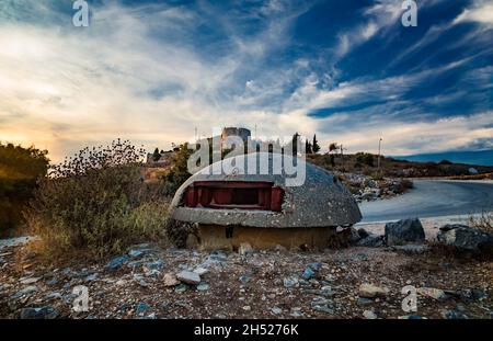 Close-up of one of the countless military concrete bunkers or pillboxes in the southern Albania built during the communist government of Enver Hoxha. Stock Photo