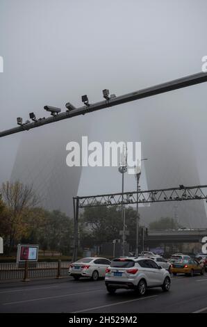 Beijing, China. 06th Nov, 2021. China Central Television CCTV headquarters building in morning mist during polluted day in Beijing, China on 06/11/2021 by Wiktor Dabkowski Credit: dpa/Alamy Live News Stock Photo