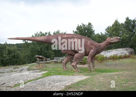 Recreation of a real-size fiberglass iguanodon. Site of ichnites of Regumiel de la Sierra, Burgos, Spain. Stock Photo