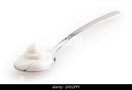 Spoon of mayonnaise isolated on white background with clipping path Stock Photo
