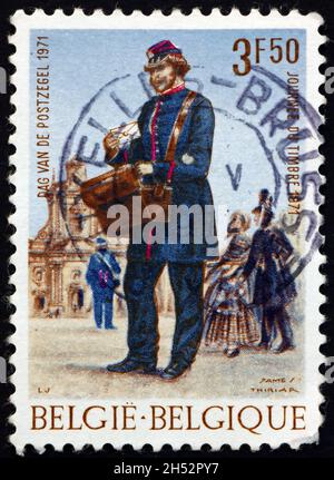 BELGIUM - CIRCA 1971: a stamp printed in Belgium shows Mailman, circa 1971 Stock Photo
