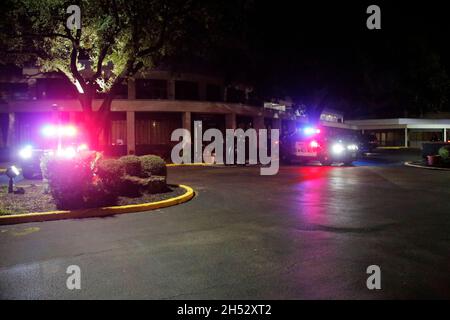 Houston, USA. 06th Nov, 2021. (211106) -- HOUSTON, Nov. 6, 2021 (Xinhua) -- Police cars are seen outside a reunification center set up for missing attendees of the Astroworld music festival in Houston, Texas, the United States, Nov. 6, 2021. At least eight people died and scores of others were injured at the Astroworld music festival in the U.S. city of Houston on Friday night, officials said. The incident was said to have taken place at around 9:15 p.m. local time when rapper Travis Scott was performing. At least 17 people were transported to hospital after the crush and 11 taken by ambulance Stock Photo