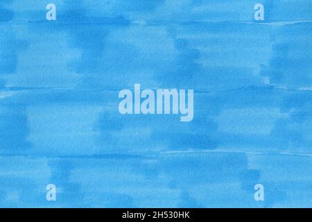 closeup macro of permanent blue marker doodles brushes on white background paper with visible surface fiber structure details Stock Photo