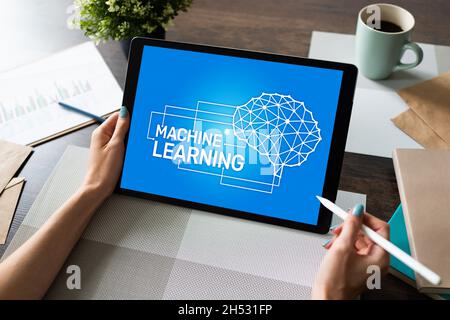 Machine learning, artificial intelligence and smart technology concept on device screen. Stock Photo