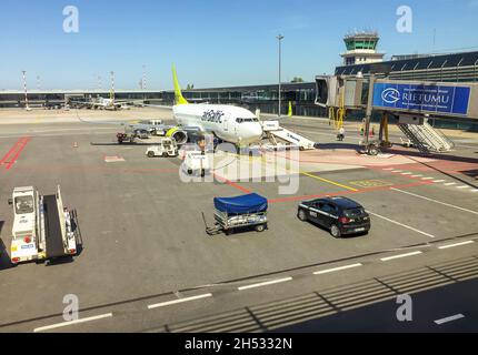 Riga, Latvia - May 5, 2018: AirBaltic Aircraft preparation for departure in the Riga International Airport. Stock Photo