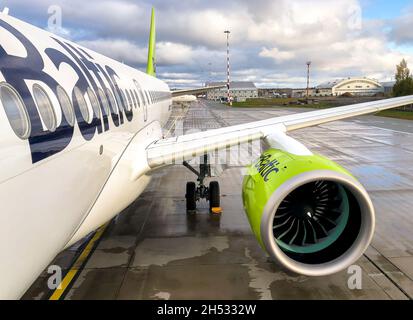 Riga, Latvia - October 28, 2018: AirBaltic Aircraft preparation for departure in the Riga International Airport. Stock Photo