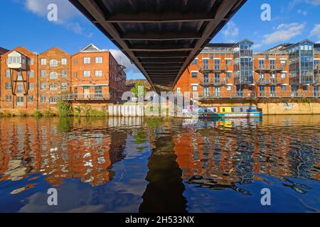 UK, West Yorkshire, Leeds, Under Centenary Bridge with Riverside Apartments on The Calls Stock Photo