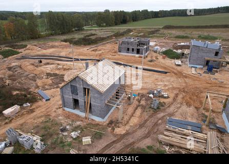 Building a country house of expanded-clay concrete blocks. Unfinished private home of ceramsite concrete blocks on a construction site.Construction wo Stock Photo