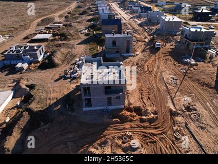 Building a country house of expanded-clay concrete blocks. Unfinished private home of ceramsite concrete blocks on a construction site.Construction wo Stock Photo