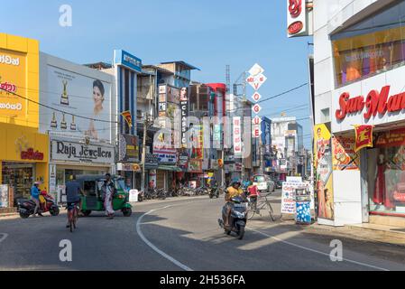 NEGOMBO, SRI LANKA - FEBRUARY 03, 2020: On one of the central streets of modern Negombo Stock Photo